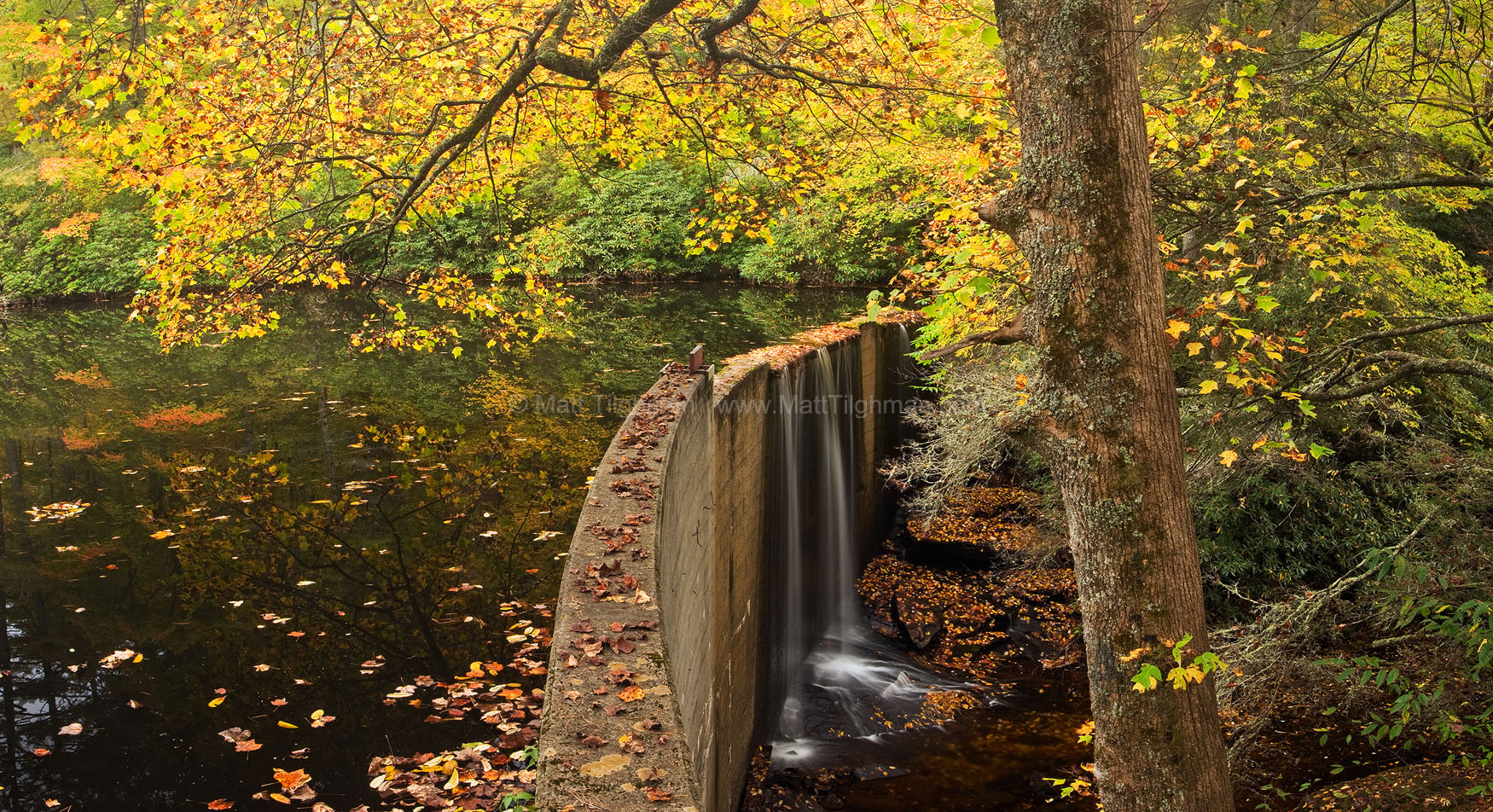 Hampton Lake in Fall - Cashiers, North Carolina Fine art stock landscape photograph of Hampton Lake, in High Hampton Inn. In autumn, the lake becomes a mirror for the stunning fall color in the trees above.