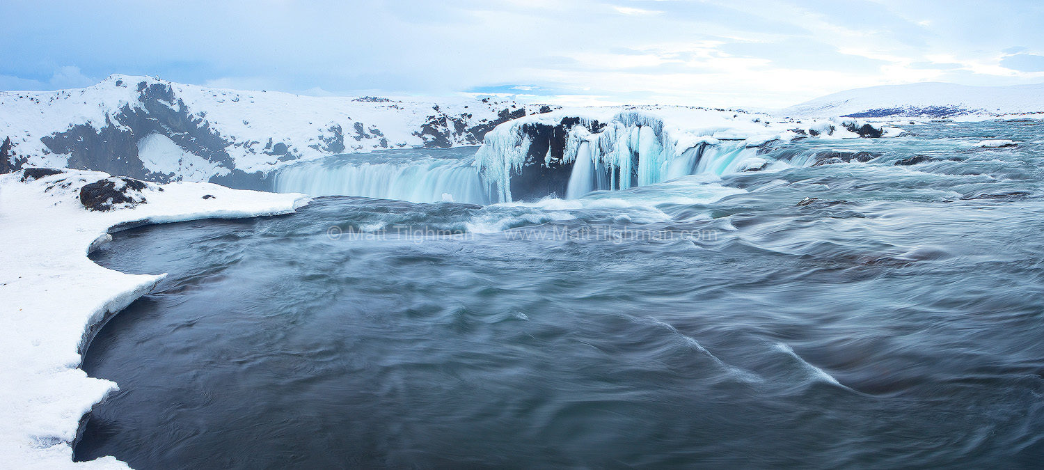 Fine art stock photograph of Godafoss in winter. Godafoss, or the waterfall of the gods, is a spectacular large waterfall in Iceland's interior.